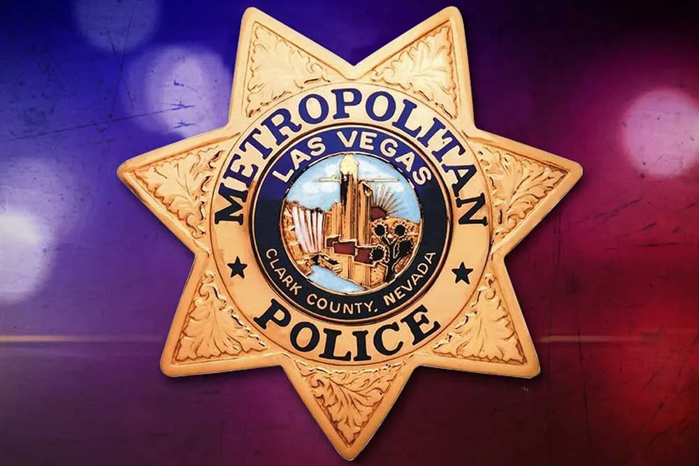 The ccw-training-image-3 features a gold, star-shaped Las Vegas Metropolitan Police badge with “Clark County, Nevada” and a city image on a purple-red gradient—perfect for those seeking firearm safety training in Las Vegas.
