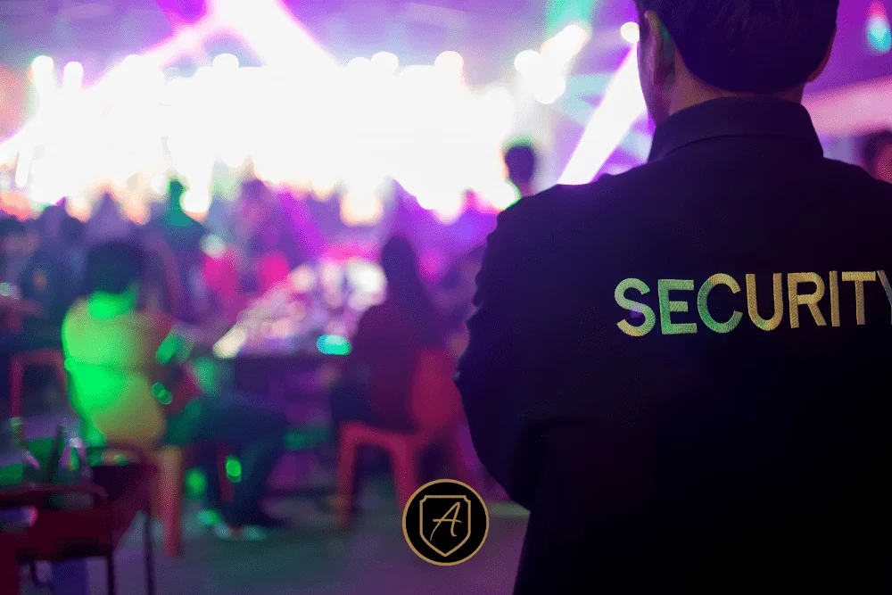 Holiday Event Security in Las Vegas_ Reliable Protection for Parties, Casinos, and Seasonal Crowds-3 Security professional monitoring a crowded holiday event venue with active crowd control by Alexios Security Solutions in Las Vegas.